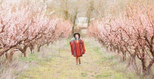 Boho style woman walking in spring garden. Royalty Free Stock Photo Boho style woman walking in spring garden. Royalty Free Stock Photo