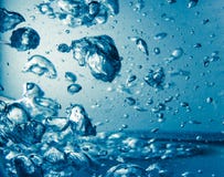 Boiled water with bubbles stock photos Boiled water with bubbles stock photos