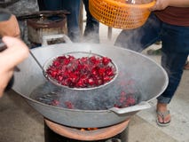 Boiling Jamaican Sorrel for a short time. royalty free stock photo Boiling Jamaican Sorrel for a short time. royalty free stock photo