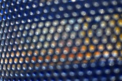 Bokeh bleu perforé de feuillard Fond lumineux abstrait au sujet de technologie images stock Bokeh bleu perforé de feuillard Fond lumineux abstrait au sujet de technologie images stock