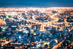 Bokeh da skyline de Cape Town do monte do sinal após o por do sol foto de stock royalty free Bokeh da skyline de Cape Town do monte do sinal após o por do sol foto de stock royalty free