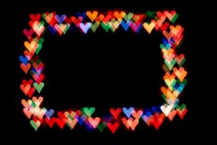 Bokeh hearts isolated on a black background hearts of different colors form the frame royalty free stock photo Bokeh hearts isolated on a black background hearts of different colors form the frame royalty free stock photo