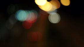 Boken blurred colors, beautiful, bright abstract. A blend of beautiful colors. Follow the fire at night. And the blur of the pictu stock footage Boken blurred colors, beautiful, bright abstract. A blend of beautiful colors. Follow the fire at night. And the blur of the pictu stock footage