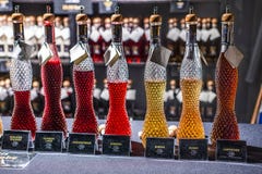 Bonn Germany 17.12.2017 crystal Glass bottles filled with different brandy liqueur variations sold on christmas market royalty free stock photos Bonn Germany 17.12.2017 crystal Glass bottles filled with different brandy liqueur variations sold on christmas market royalty free stock photos