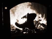 Boots military burns in the furnace of the fire of war stock photos Boots military burns in the furnace of the fire of war stock photos
