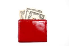 Borsa rossa con soldi su un fondo bianco fotografie stock libere da diritti Borsa rossa con soldi su un fondo bianco fotografie stock libere da diritti