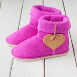 Bottes roses d'hiver photographie stock libre de droits Bottes roses d'hiver photographie stock libre de droits