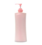 Bottiglia di plastica rosa isolata su bianco immagine stock libera da diritti Bottiglia di plastica rosa isolata su bianco immagine stock libera da diritti
