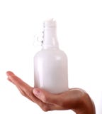 Bottle And Female Hand Stock Photo