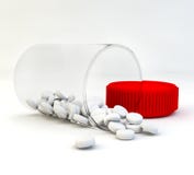 Bottle With White Tablets Royalty Free Stock Photos