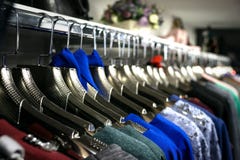 Boutique of clothes. Dresses in boutique weigh on hangers. Horizontal photo stock photo Boutique of clothes. Dresses in boutique weigh on hangers. Horizontal photo stock photo
