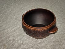 Bowl of brown clay on the table. royalty free stock image Bowl of brown clay on the table. royalty free stock image