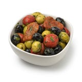 Bowl with green and black olives, peppers and tomatoes Royalty Free Stock Photos Bowl with green and black olives, peppers and tomatoes Royalty Free Stock Photos