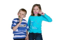 Boy And Girl Brushing Teeth Royalty Free Stock Images