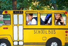 Boy And Girl In Small School Bus Stock Image