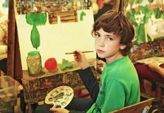 Boy in art school has paiting lesson stock photo Boy in art school has paiting lesson stock photo