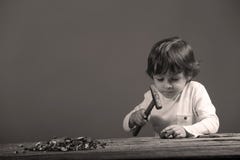 Boy cracking nuts Stock Image Boy cracking nuts Stock Image