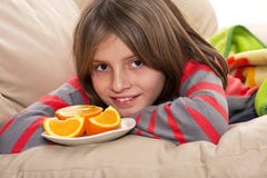 Boy Eating Fresh Oranges Stock Photos