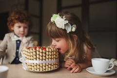 Boy and girl having tea party in cafe royalty free stock photo Boy and girl having tea party in cafe royalty free stock photo