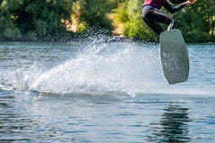 Boy having fun with waterski on the lake royalty free stock photography Boy having fun with waterski on the lake royalty free stock photography
