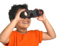 Boy looking through a binocular