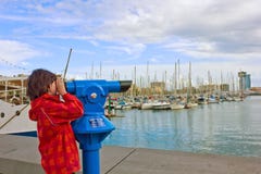 Boy looking in telescope Stock Photo Boy looking in telescope Stock Photo