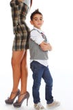 Boy Posing Near Woman`s Legs Stock Image