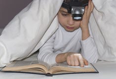 Boy reads the book Boy reads the book