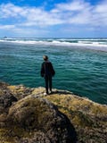 Boy Scanning Sea Horizon for incoming waves royalty free stock image Boy Scanning Sea Horizon for incoming waves royalty free stock image