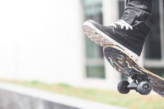 Boy skater is doing stunt at the street royalty free stock photos Boy skater is doing stunt at the street royalty free stock photos