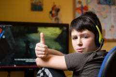 Boy Using Computer At Home, Playing Game Royalty Free Stock Image