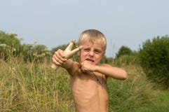 Boy With A Slingshot. Stock Photos