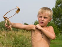 Boy With A Slingshot. Stock Images