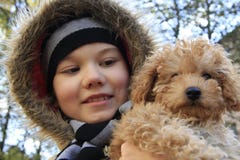Boy With Small Dog Royalty Free Stock Photo