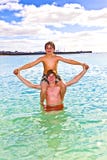 Boys Having Fun In The Clear Sea Royalty Free Stock Images