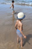 Boys playing on a beach royalty free stock photos Boys playing on a beach royalty free stock photos
