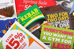 Junk Mail Leaflets. Bracknell, United Kingdom - April 3rd, 2011: Assorted leaflets and pamphlets advertising fast food and drink, retail sales, gym membership Junk Mail Leaflets. Bracknell, United Kingdom - April 3rd, 2011: Assorted leaflets and pamphlets advertising fast food and drink, retail sales, gym membership