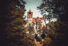 Bran Castle among the forests of the Carpathian Mountains. Abode of Dracula in Transylvania, Romania Stock Image Bran Castle among the forests of the Carpathian Mountains. Abode of Dracula in Transylvania, Romania Stock Image