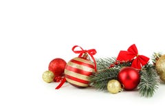 Branch of Christmas tree with balls isolated on white background
