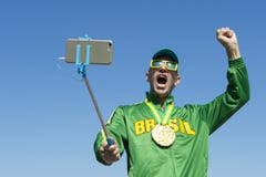 Brazil Gold Medal Athlete Taking Selfie with Selfie Stick stock photos Brazil Gold Medal Athlete Taking Selfie with Selfie Stick stock photos