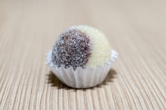 Brazilian candies Brigadeiros on the wood background stock image Brazilian candies Brigadeiros on the wood background stock image