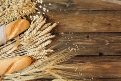 Bread And Three Types Of Cereals - Wheat, Rye And Oats On A Wood Stock Image