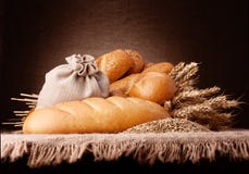 Bread, Flour Sack And Ears Bunch Still Life Stock Photo Bread, Flour Sack And Ears Bunch Still Life Stock Photo