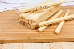 Breadsticks with sesame seeds and wheat ear close-up stock photography Breadsticks with sesame seeds and wheat ear close-up stock photography