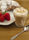 Breakfast with coffee , fresh croissants and strawberries. Royalty Free Stock Photos Breakfast with coffee , fresh croissants and strawberries. Royalty Free Stock Photos