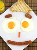Breakfast on a plate of a funny face Royalty Free Stock Photo Breakfast on a plate of a funny face Royalty Free Stock Photo