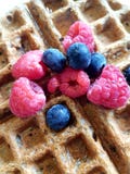 Breakfast waffle topped with fresh respberries, blue berries and stock photos Breakfast waffle topped with fresh respberries, blue berries and stock photos