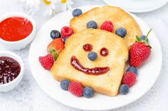 Breakfast With A Smiling Toast, Fresh Berries, Jams Royalty Free Stock Photography Breakfast With A Smiling Toast, Fresh Berries, Jams Royalty Free Stock Photography