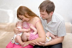 Breast Feeding Two Little Sisters Twin Stock Images Breast Feeding Two Little Sisters Twin Stock Images
