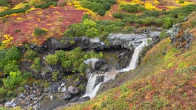 A breathtaking view of the two-stage waterfall. Travel to the Kamchatka Peninsula.